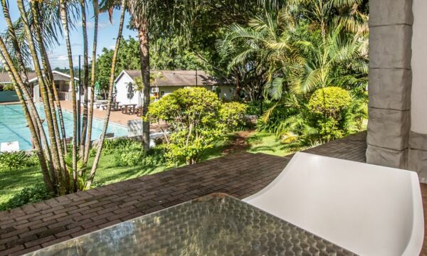 Deluxe room terrace with coffee table ANEW Hotels & Resort